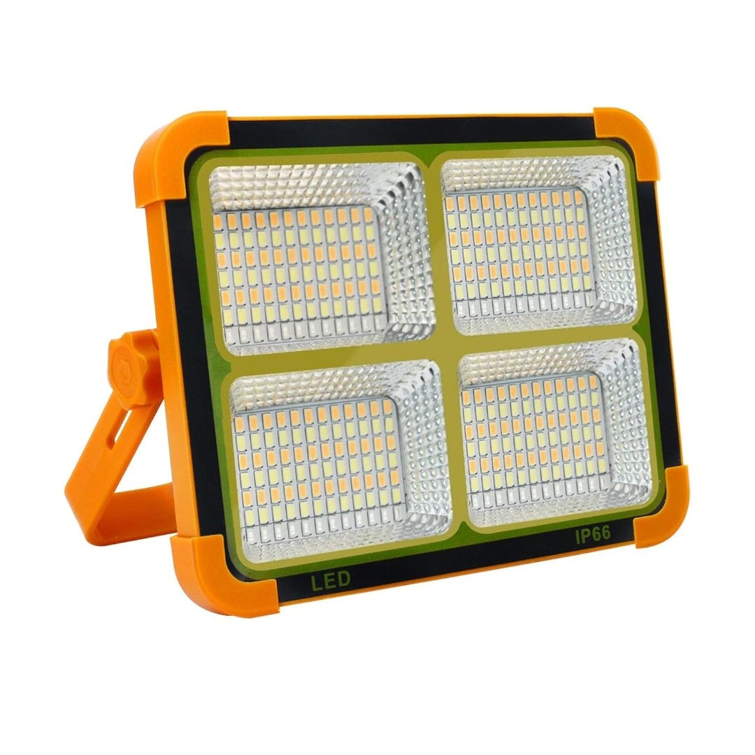 Solar LED Flood Light – 4 Panel High Power Rechargeable Outdoor Lamp with USB Mobile Charging, IP66 Waterproof, Foldable Stand & Portable Handle (1 Pc)